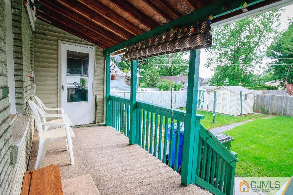 129 Middlesex Avenue Iselin, NJ 08830 - Photo 6 of 23 a view of a house with backyard and porch