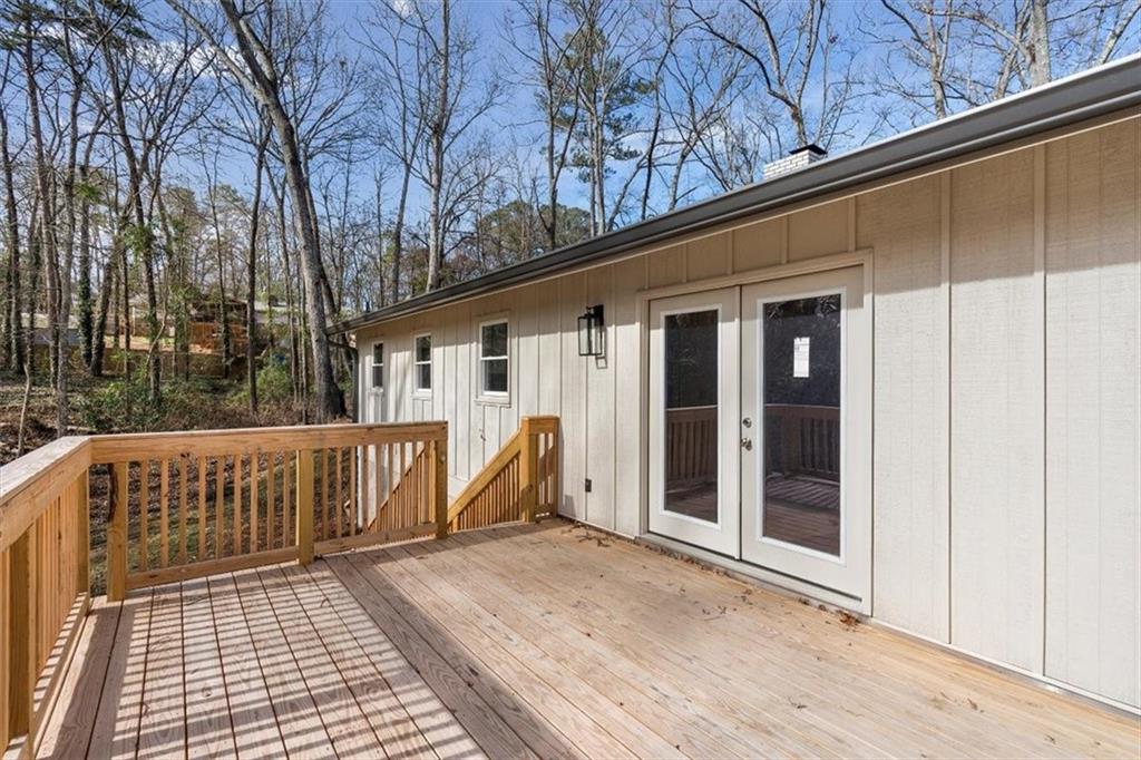 49 Apache Trail Cartersville, GA 30120 - Photo 43 of 52 a view of a house with a wooden deck