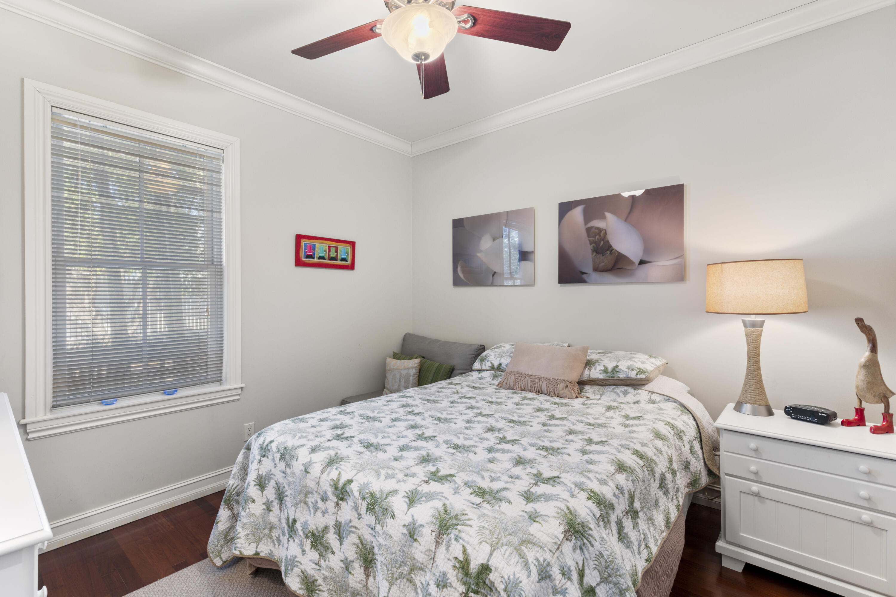 120 Angela Street, Unit 102 Key West, FL 33040 - Photo 16 of 24 a bedroom with a large bed and a window