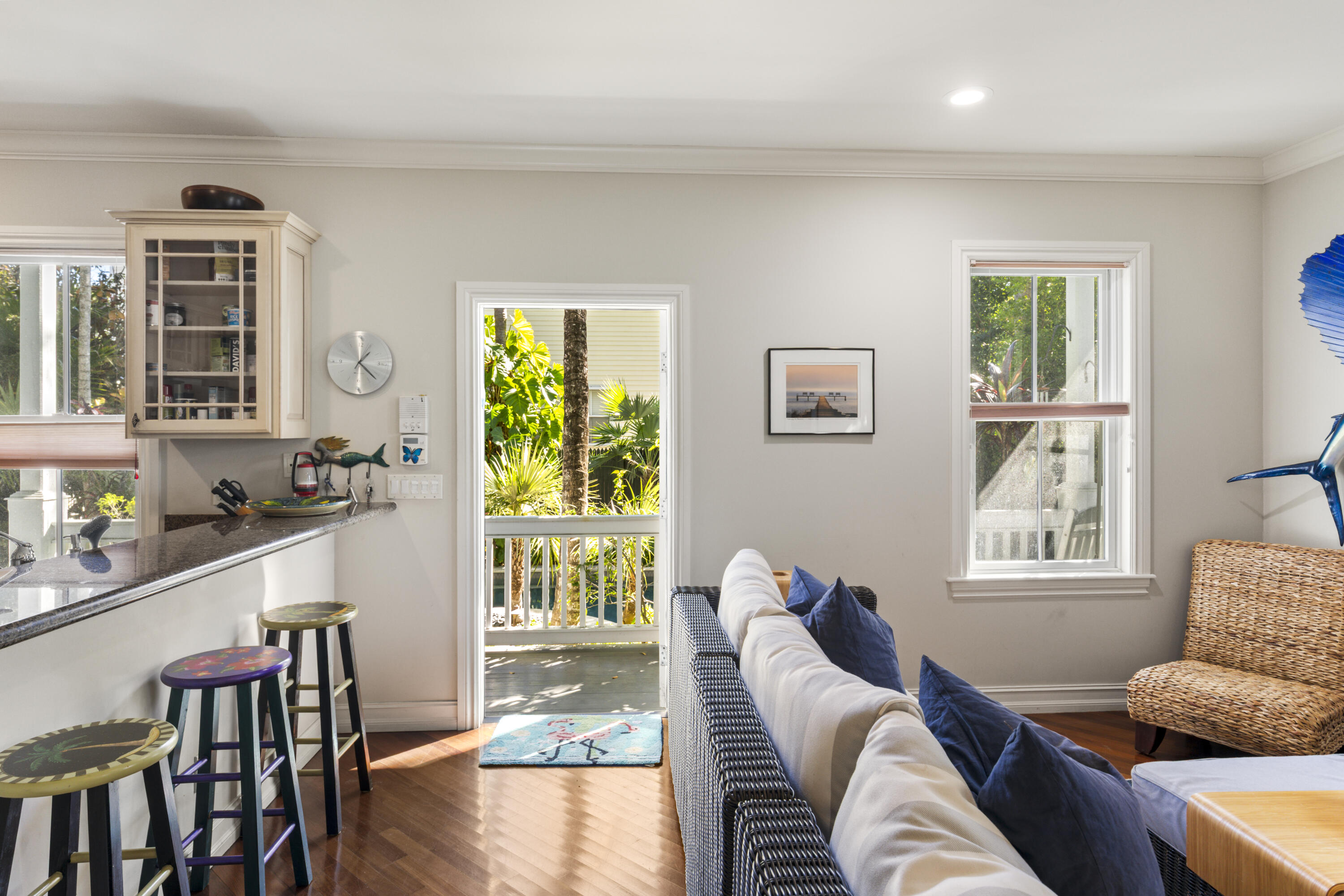 120 Angela Street, Unit 102 Key West, FL 33040 - Photo 6 of 24 a living room with furniture and windows