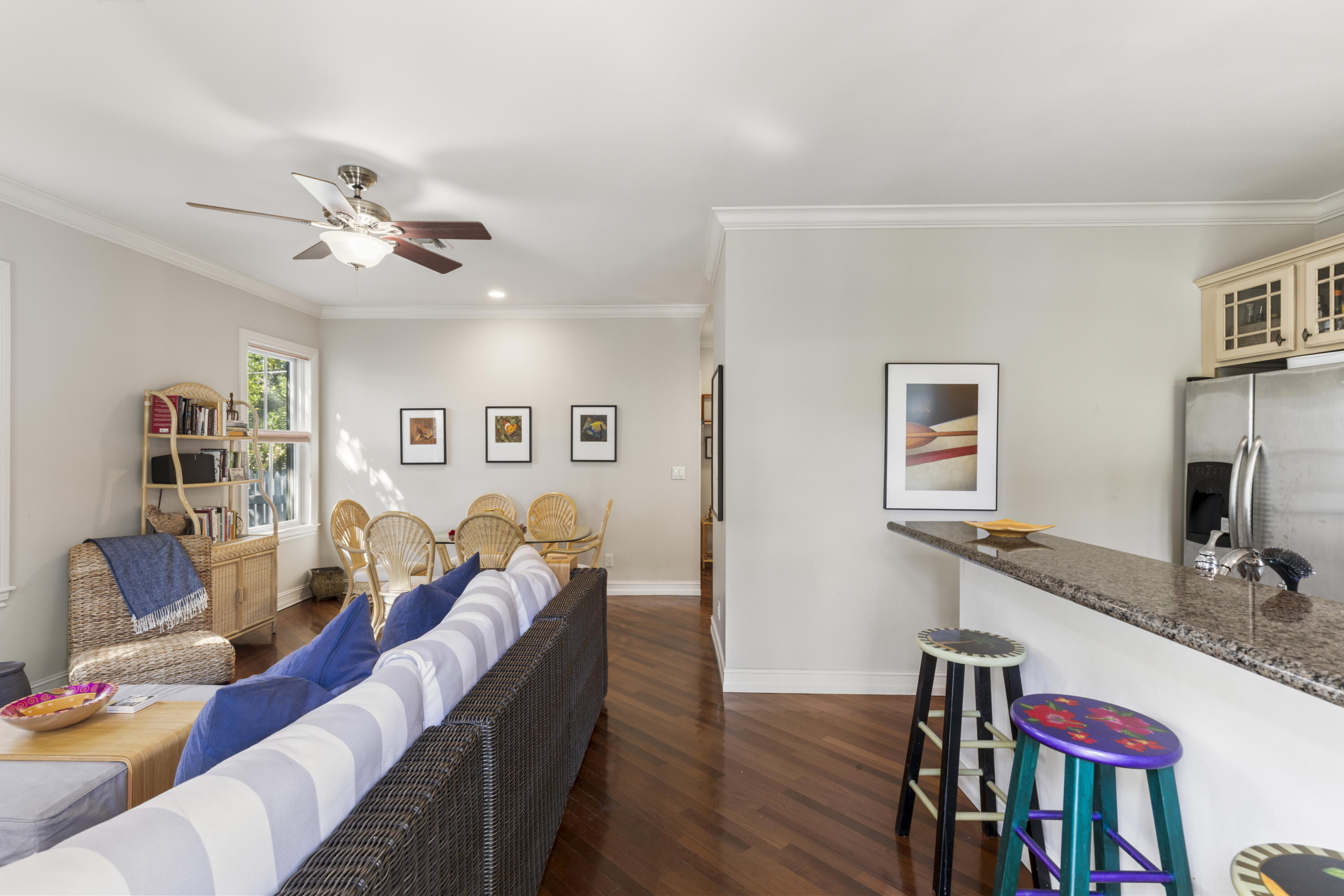120 Angela Street, Unit 102 Key West, FL 33040 - Photo 10 of 24 a living room with furniture and a flat screen tv