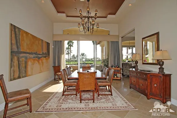 a bedroom with a bed and a fireplace