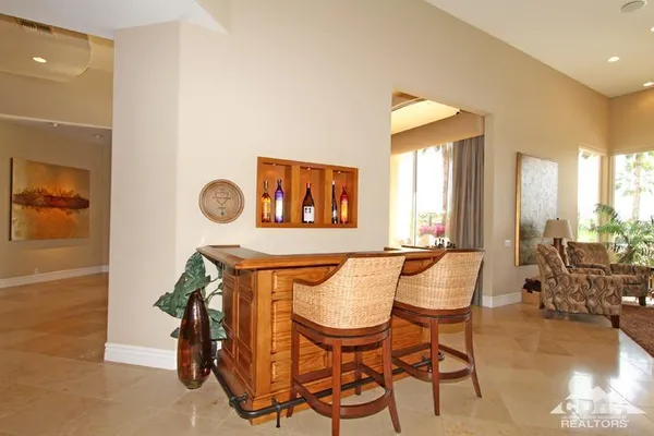 a bathroom with a sink mirror and a bathtub
