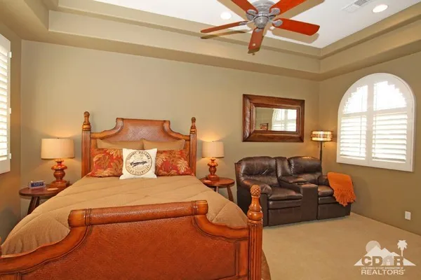 a bathroom with a double vanity sink and mirror