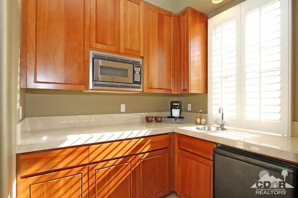 a bathroom with a sink and a washing machine