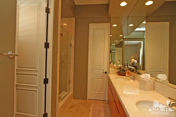 a view of a house with backyard porch and sitting area