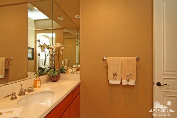 a view of a house with sitting area and garden