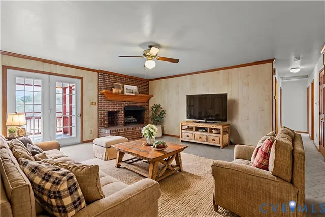 a bedroom with a bed couch and a window