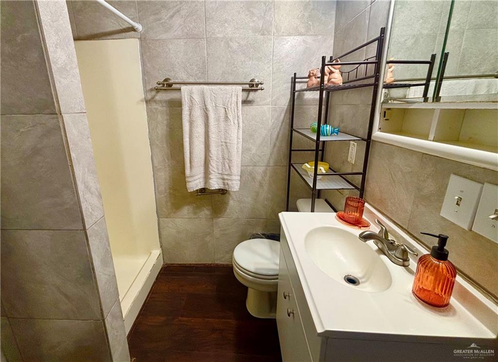 513 West Clam Circle Port Isabel, TX 78578 - Photo 20 of 37 a bathroom with a sink toilet and shower
