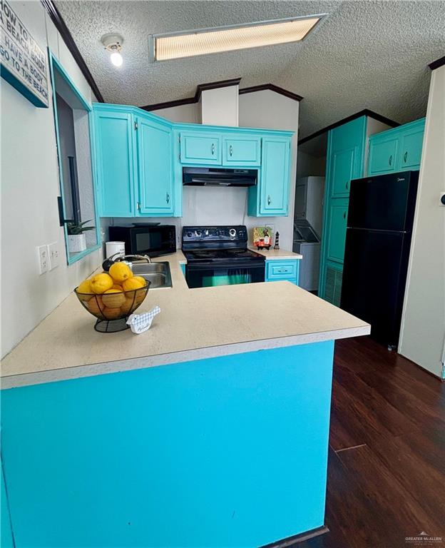 513 West Clam Circle Port Isabel, TX 78578 - Photo 10 of 37 a kitchen with stainless steel appliances a refrigerator sink and microwave