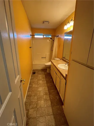 a bathroom with a tub and a shower