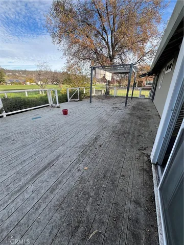 a view of outdoor space with garden and ocean view