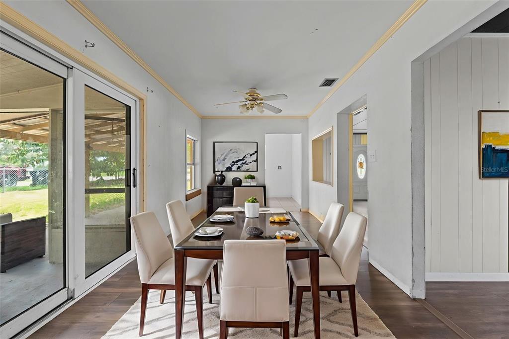 330 West 4th Street Frostproof, FL 33843 - Photo 12 of 39 a view of a dining room with furniture window and outside view