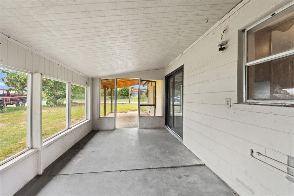 330 West 4th Street Frostproof, FL 33843 - Photo 30 of 39 a view of an entryway with a floor to ceiling window