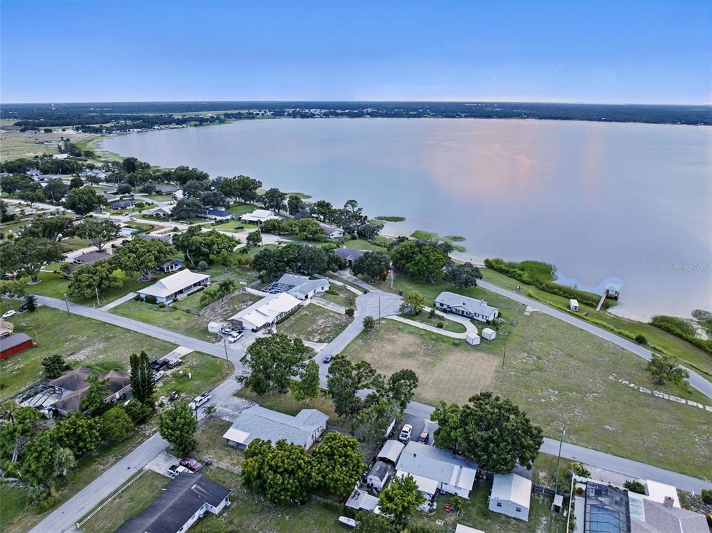 330 West 4th Street Frostproof, FL 33843 - Photo 38 of 39 an aerial view of a city with lake view