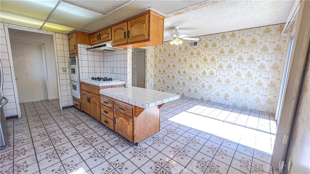 1702 East Bach Street Carson, CA 90745 - Photo 28 of 48 a bathroom with a tub shower and sink