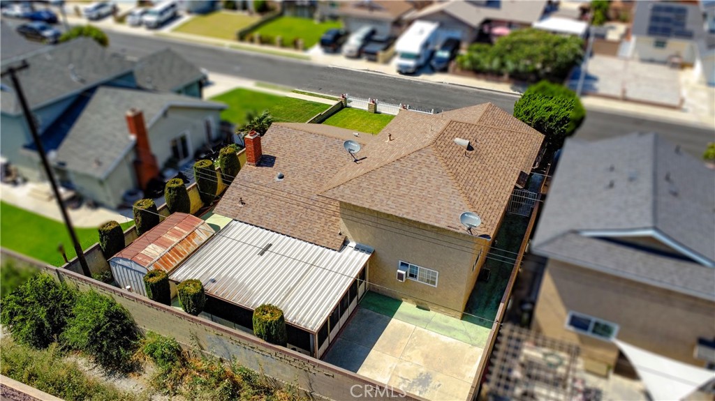 1702 East Bach Street Carson, CA 90745 - Photo 4 of 48 an aerial view of a house with a garden