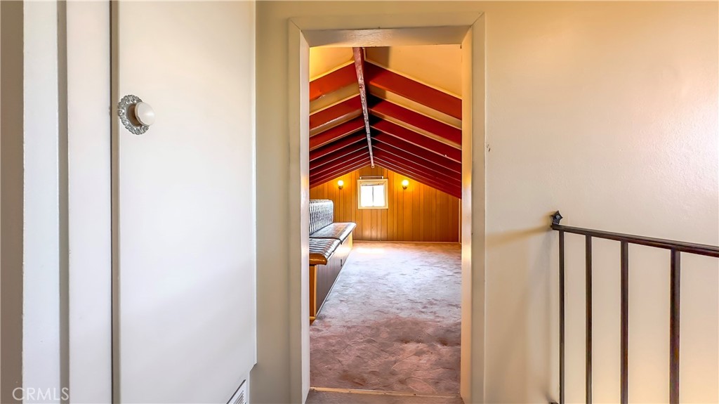 1702 East Bach Street Carson, CA 90745 - Photo 43 of 48 a view of a hallway with a door and a window
