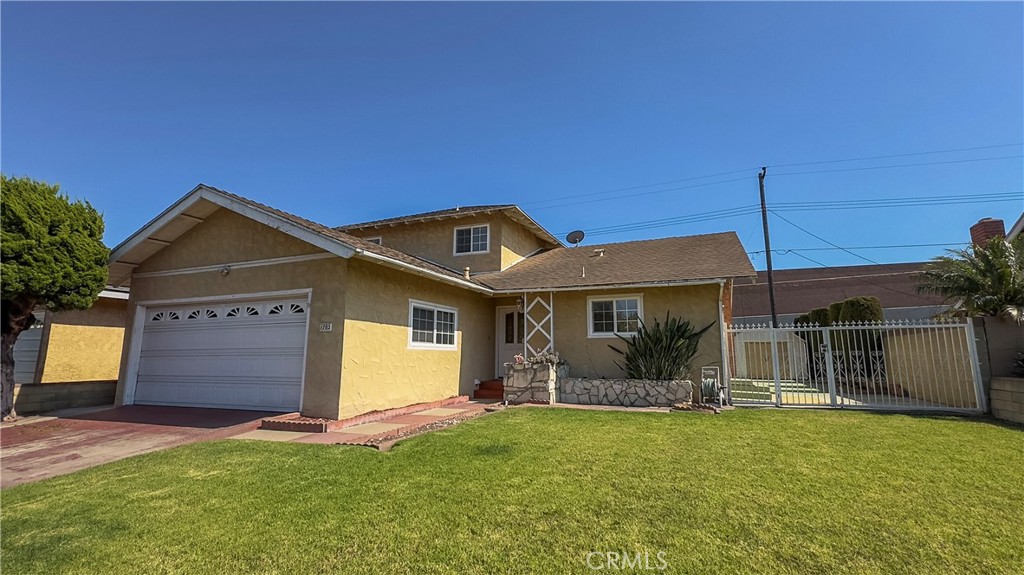 1702 East Bach Street Carson, CA 90745 - Photo 8 of 48 front view of house with a yard