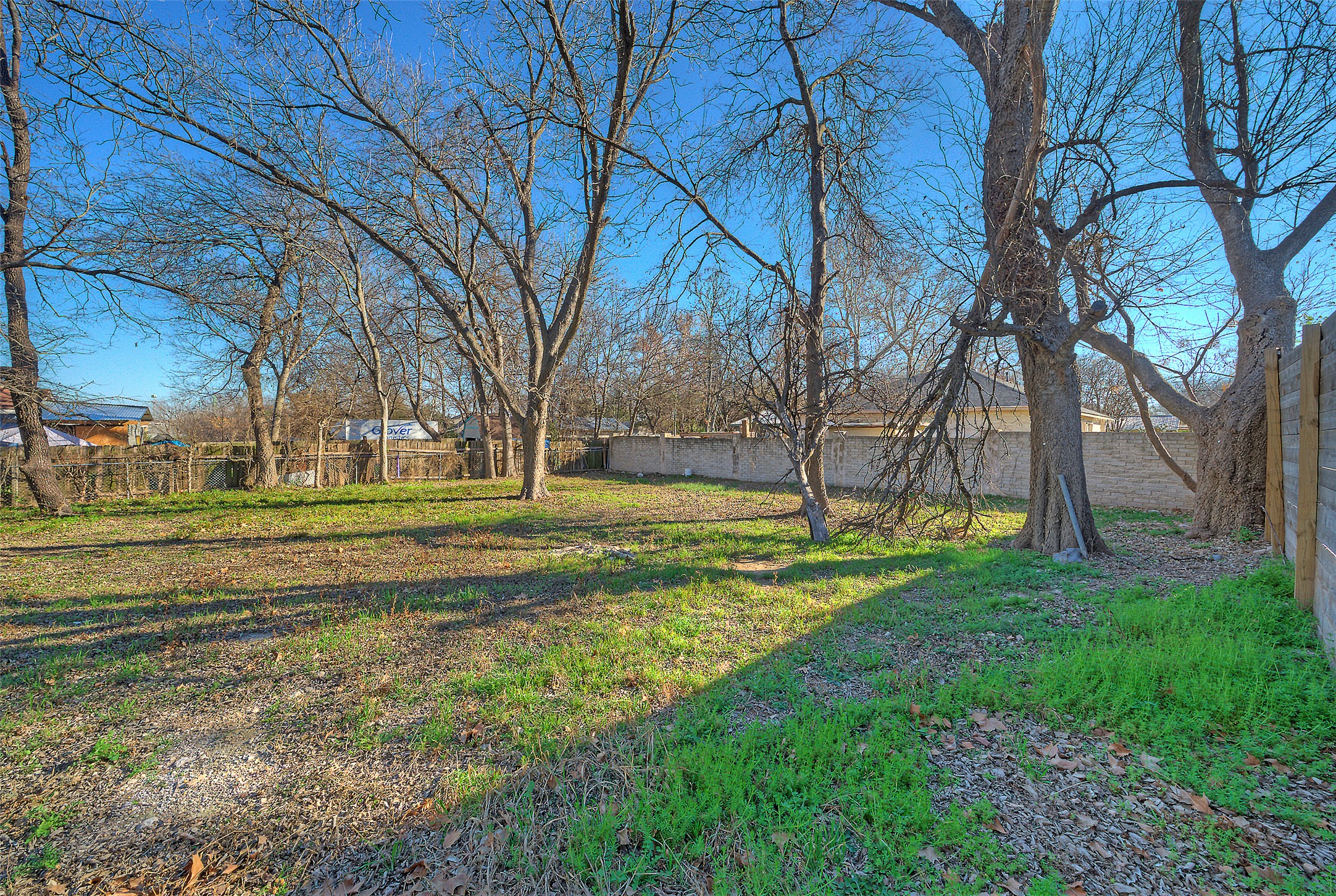 411 Hackberry Lane Austin, TX 78753 - Photo 14 of 18 a view of a playground with a large tree