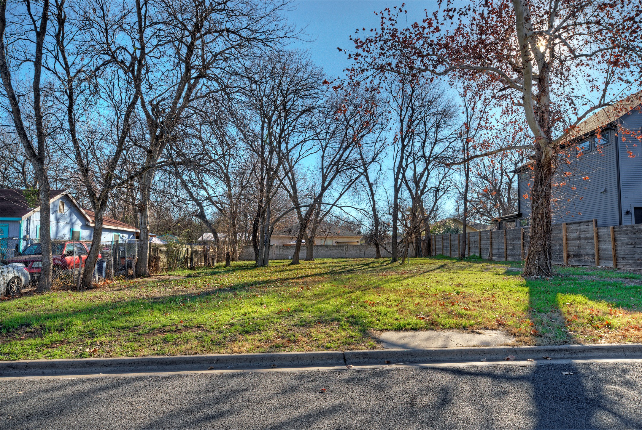411 Hackberry Lane Austin, TX 78753 - Photo 18 of 18 a view of a yard with a tree