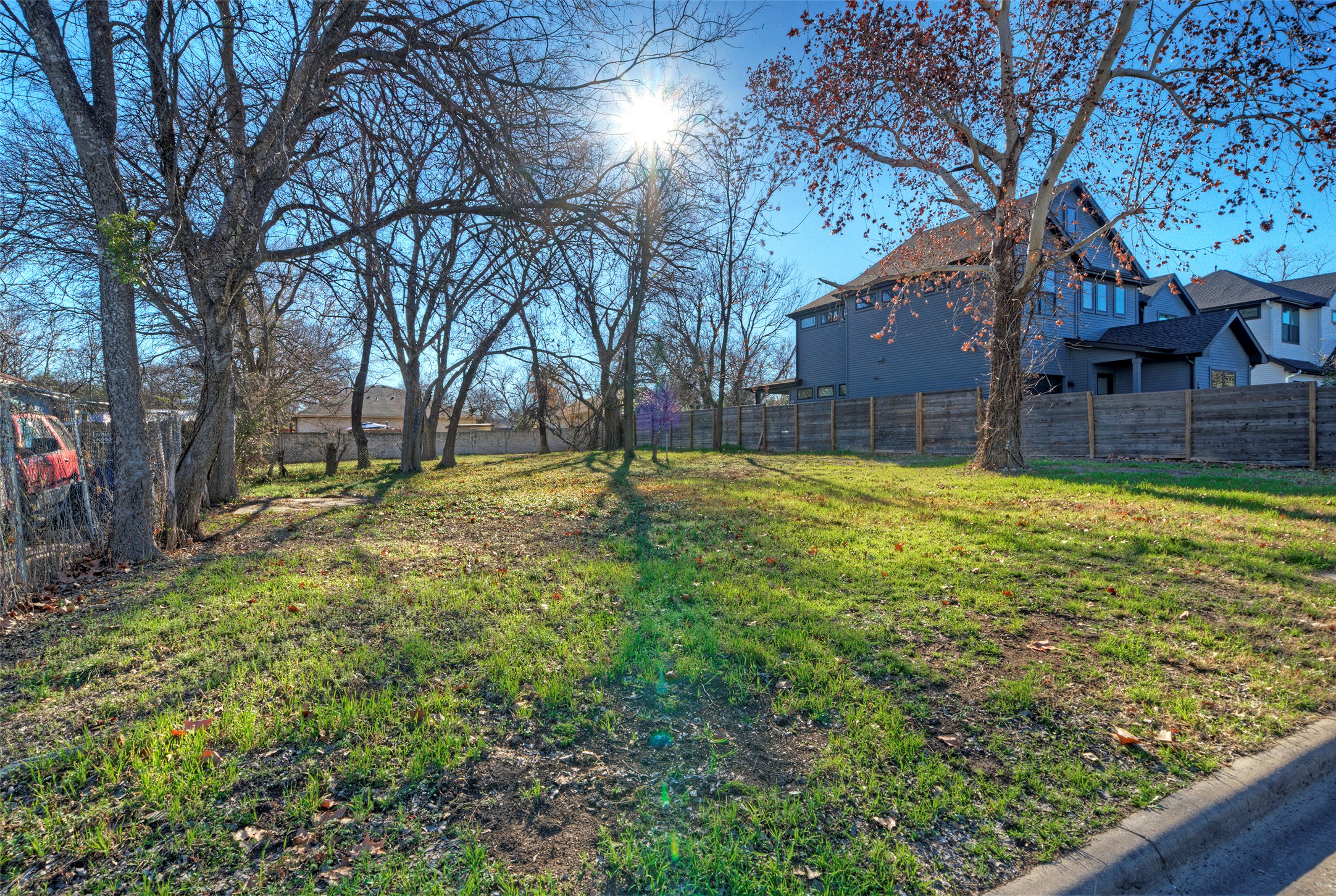 411 Hackberry Lane Austin, TX 78753 - Photo 8 of 18 a view of a house with a yard