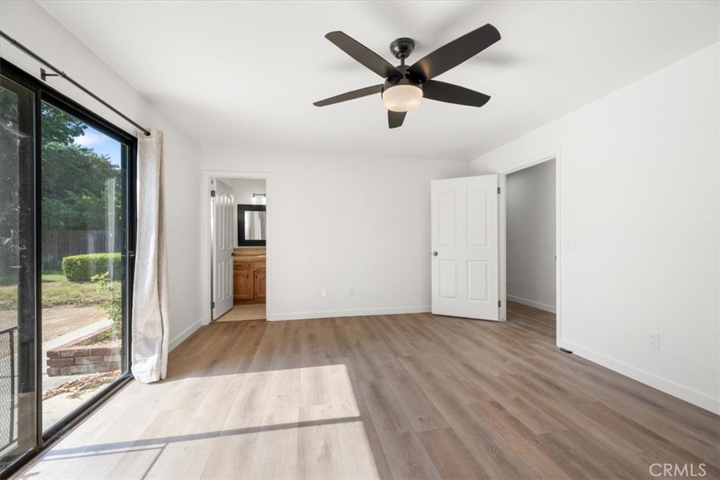 836 Casals Drive Paso Robles, CA 93446 - Photo 17 of 33 a view of a big room with wooden floor and windows