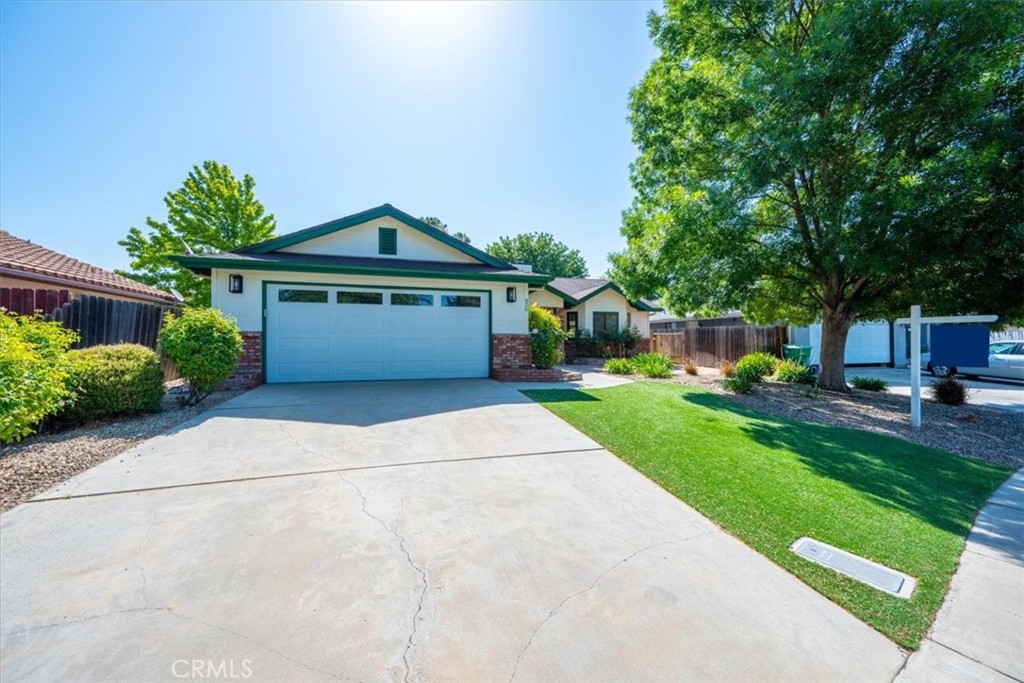 836 Casals Drive Paso Robles, CA 93446 - Photo 3 of 33 a front view of a house with a yard