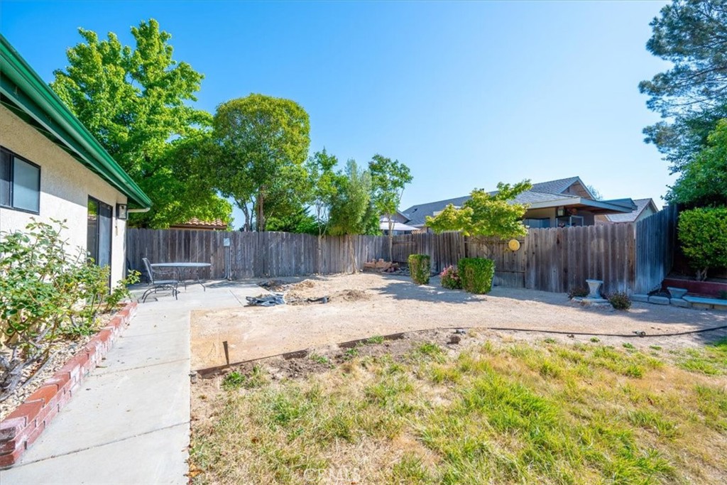 836 Casals Drive Paso Robles, CA 93446 - Photo 31 of 33 a backyard of a house with plants and tree