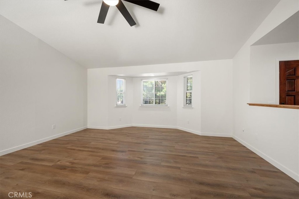 836 Casals Drive Paso Robles, CA 93446 - Photo 8 of 33 a view of empty room with wooden floor and window