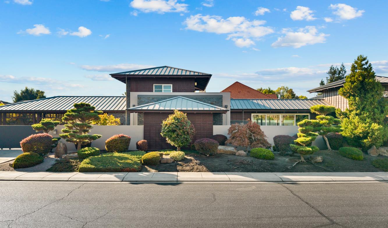 7434 River Nine Drive Modesto, CA 95356 - Photo 1 of 56 front view of house with a yard