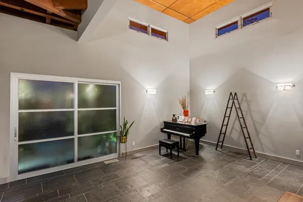 a kitchen with sink and refrigerator