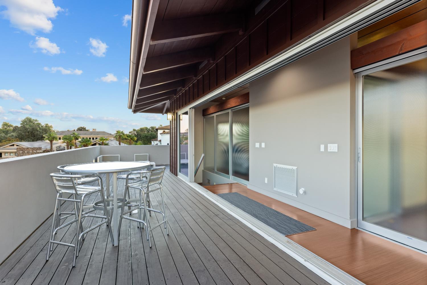 7434 River Nine Drive Modesto, CA 95356 - Photo 26 of 56 a balcony with table and chairs