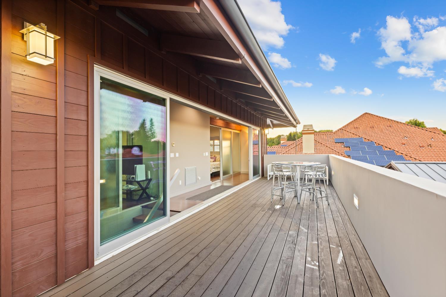 7434 River Nine Drive Modesto, CA 95356 - Photo 27 of 56 a balcony with wooden floor