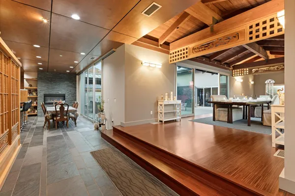 a kitchen with stainless steel appliances a stove a microwave and a counter