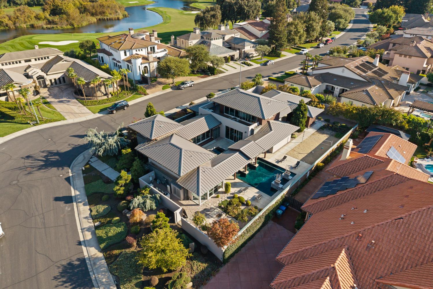7434 River Nine Drive Modesto, CA 95356 - Photo 8 of 56 an aerial view of residential houses with outdoor space