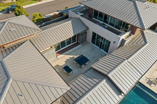 an aerial view of a house with a garden