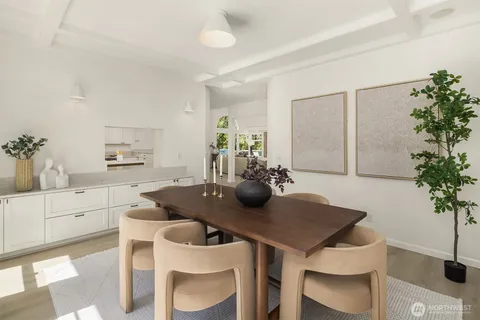 a kitchen with a table and chairs in it