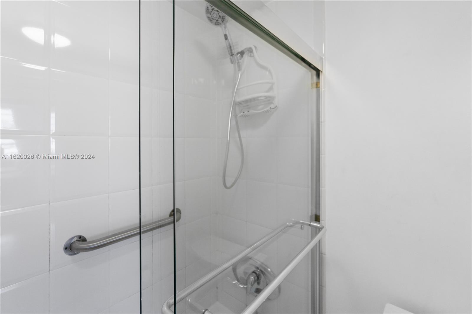 100 Lincoln Road, Unit 820 Miami Beach, FL 33139 - Photo 11 of 20 a bathroom with a shower