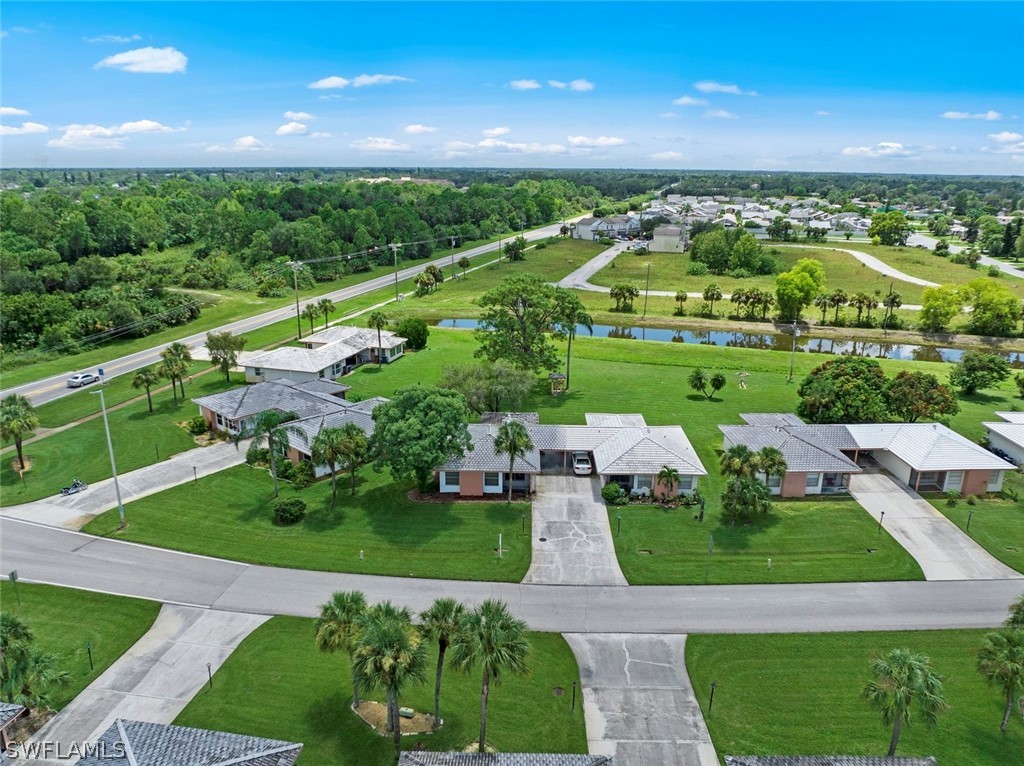 1604 Ridgecrest Street Lehigh Acres, FL 33936 - Photo 26 of 26 an aerial view of a city