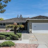 a front view of a house with a porch