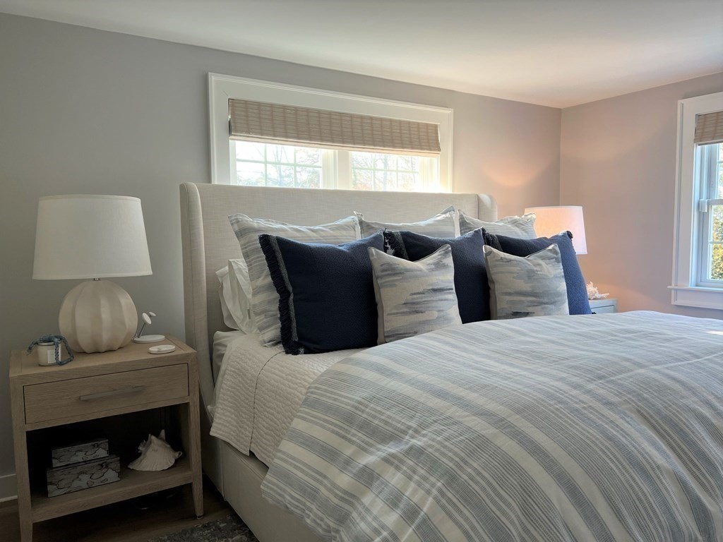 219 Training Field Road Chatham, MA 02633 - Photo 14 of 24 a bedroom with a bed and window