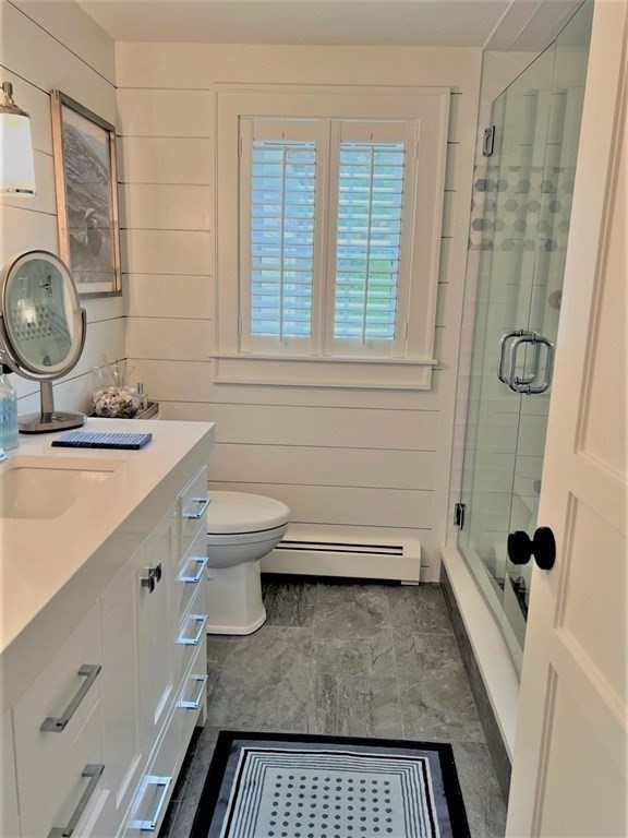 219 Training Field Road Chatham, MA 02633 - Photo 17 of 24 a bathroom with a sink toilet and shower