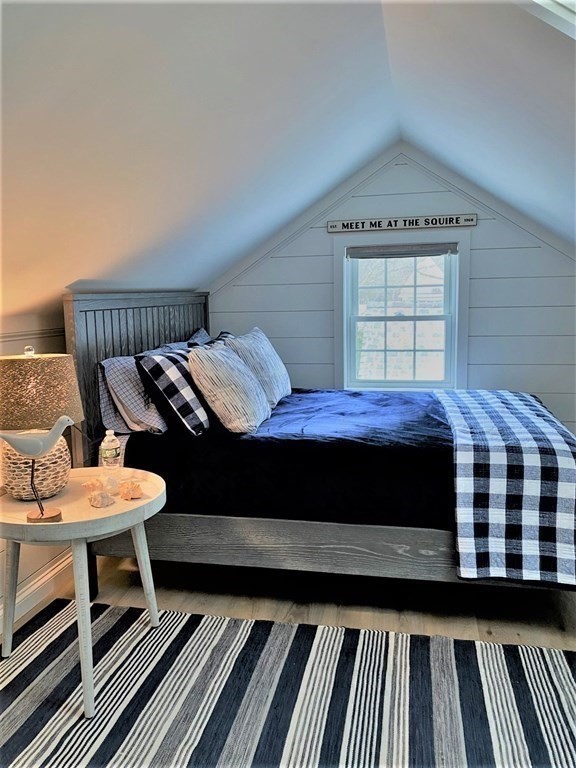 219 Training Field Road Chatham, MA 02633 - Photo 19 of 24 a bedroom with a bed and a dresser