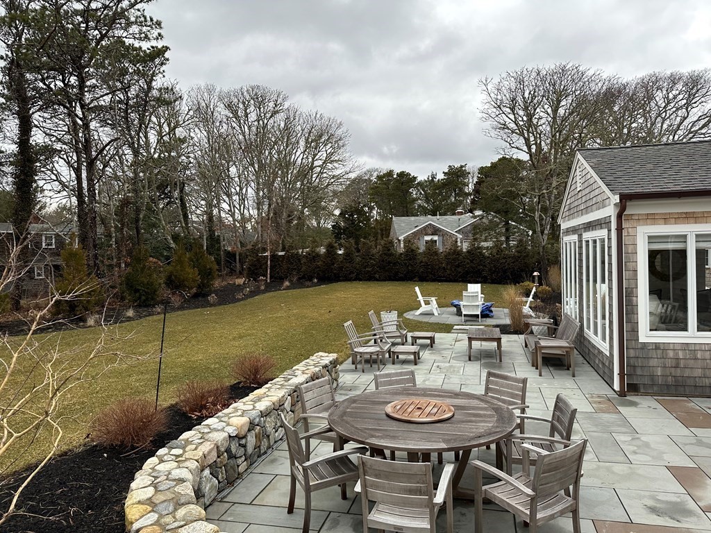 219 Training Field Road Chatham, MA 02633 - Photo 7 of 24 a view of a patio with furniture