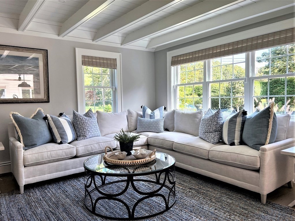 219 Training Field Road Chatham, MA 02633 - Photo 8 of 24 a living room with furniture and a large window