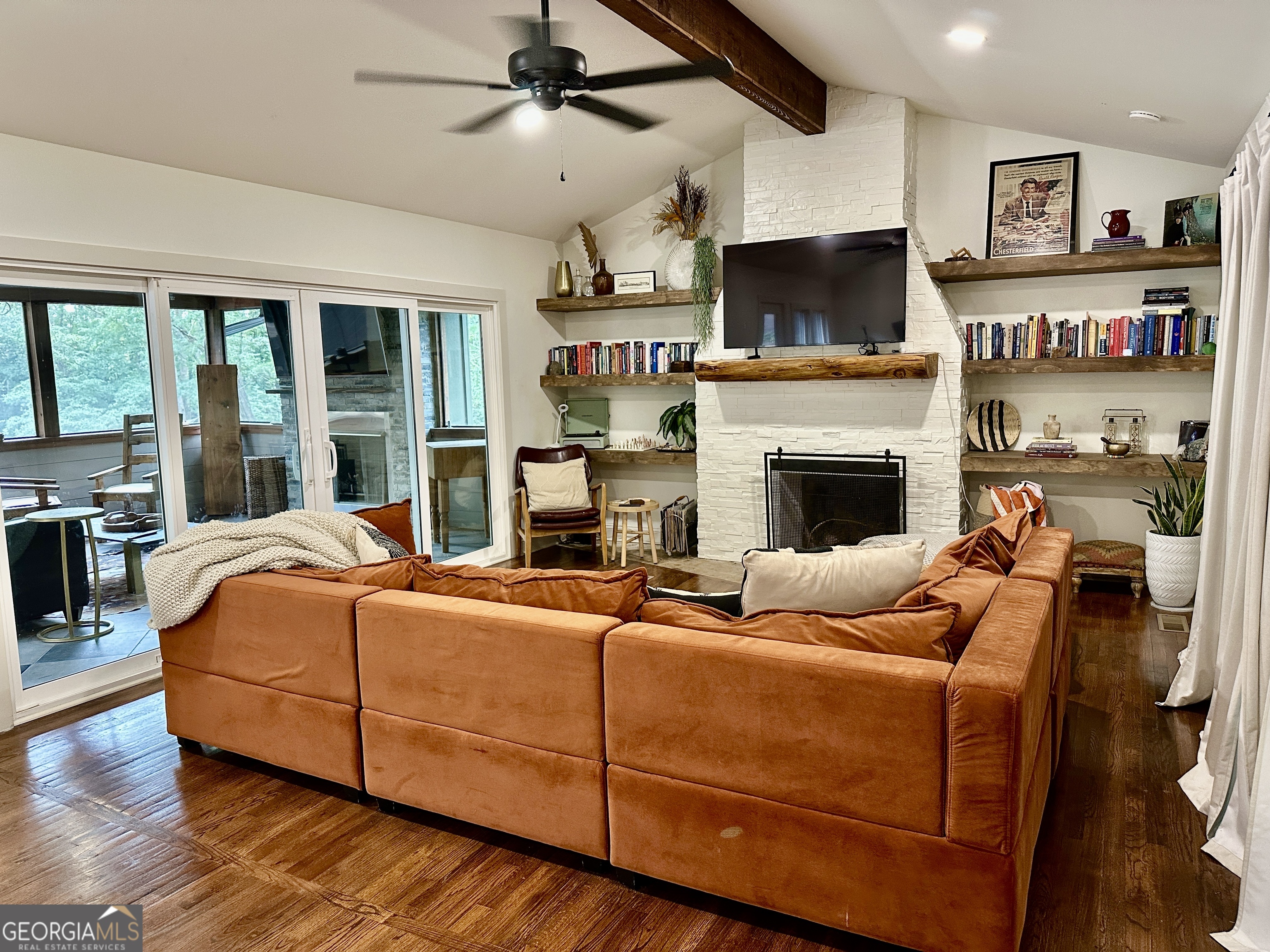 775 Ridgewood Avenue Gainesville, GA 30501 - Photo 18 of 77 a living room with furniture fireplace and flat screen tv