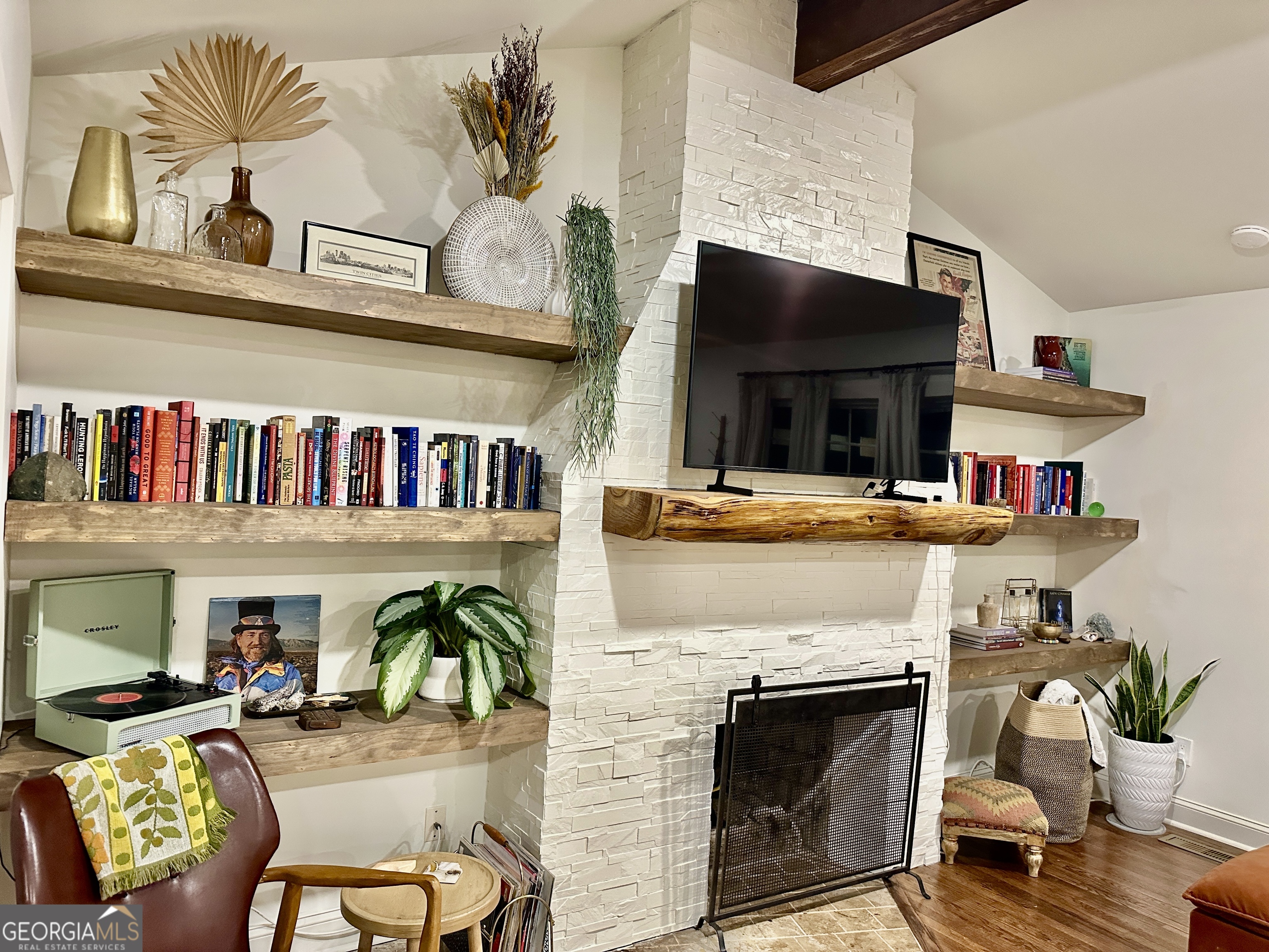 775 Ridgewood Avenue Gainesville, GA 30501 - Photo 19 of 77 a living room with furniture and a fireplace