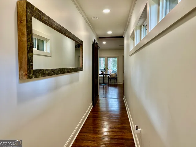 a bedroom with a bed and a desk