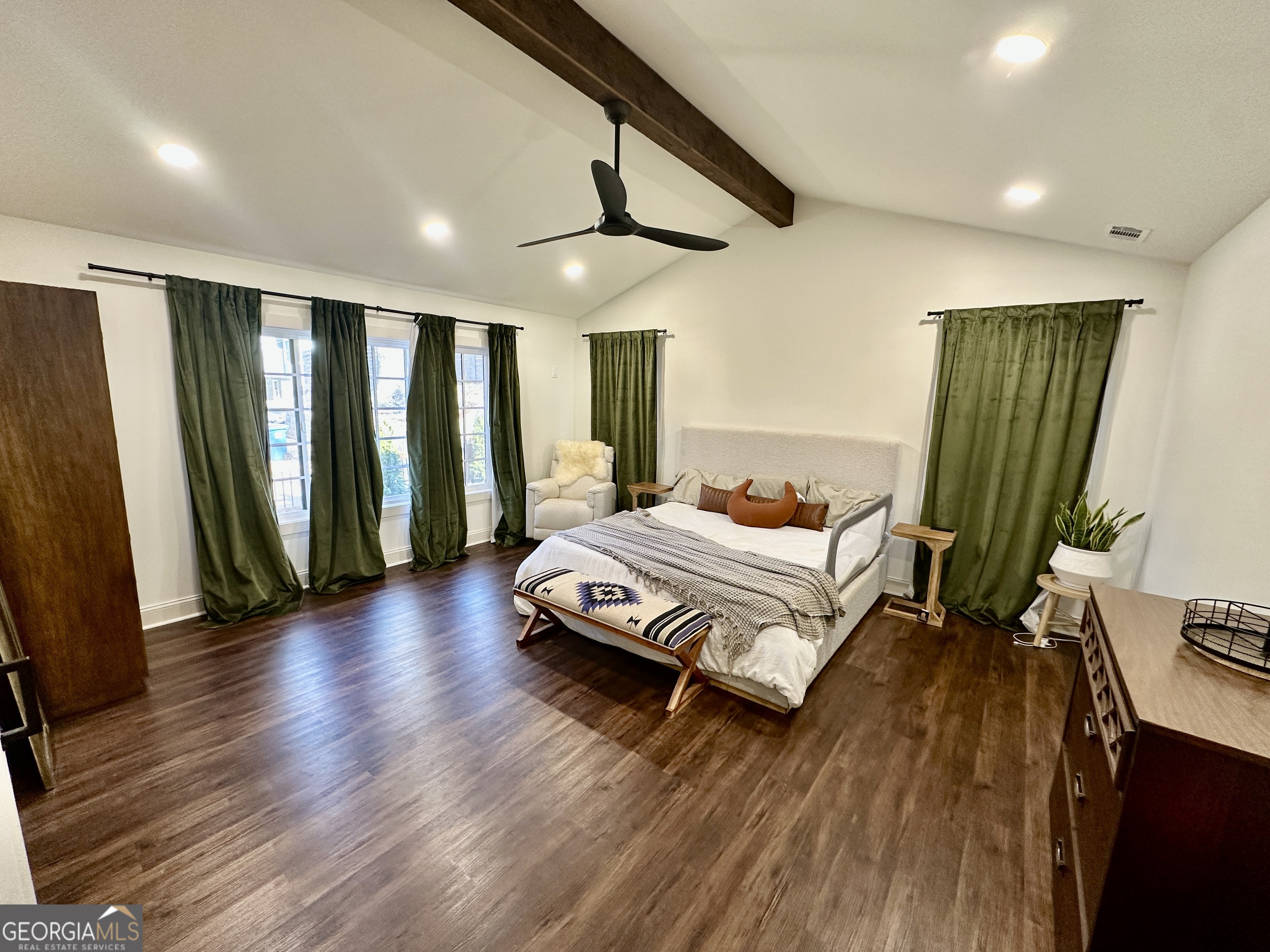 775 Ridgewood Avenue Gainesville, GA 30501 - Photo 30 of 77 a bedroom with a bed wooden floor and a large window